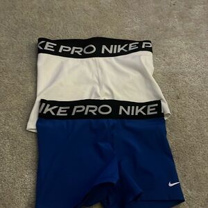 white and blue nike pro spandex